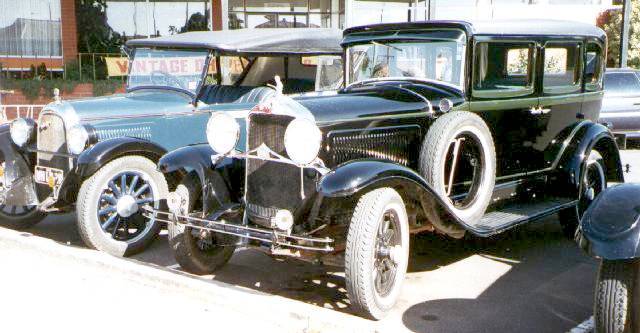 1930 Willys Knight Model 70B Sedan with 1928 Whippet 96 at rear